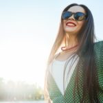 woman smiling in the sunlight