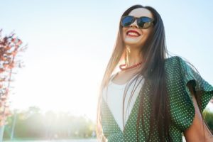 woman smiling in the sunlight